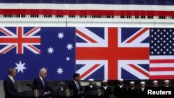 资料照:美国、英国和澳大利亚领导人2023年3月13日宣布推进AUKUS核潜艇方案。(路透社)