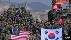 资料照片:美国和韩国军队在韩国举行实弹射击演习。(2024年3月14日)