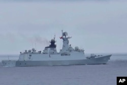 台湾海岸警卫队发布照片显示,一艘被识别为中国海军导弹护卫舰FFG 548舰只出现在台湾北部彭佳屿附近。(2024年5月23日)