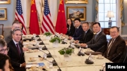 美国国务卿布林肯(左)在华盛顿与中共中联部部长刘建超(右)在华盛顿举行会谈。(2024年1月12日)