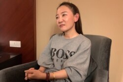 澳大利亚华裔杨恒均的妻子袁小靚在上海接受路透社的采访。(2020年10月19日)