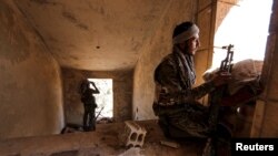 在叙利亚哈萨卡市作战的库尔德人民保卫队(YPG)成员。(资料照)