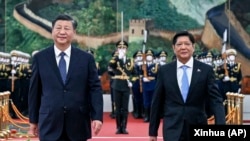 资料照:中国领导人习近平在北京人大会堂欢迎到访的菲律宾总统小马科斯。(2023年1月4日)