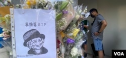 有香港市民画卡通版女皇头像,以港人独有的“事头婆“(老板娘)称呼愿她安息 (美国之音/汤慧云)