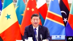 资料照片:中国国家主席习近平于2021年11月29日在中非合作论坛第八届部长级会议开幕式上发表主旨演讲。