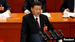 中国国家主席习近平在北京人大会堂举行的中国十三届全国人大一次会议闭幕会中发表讲话。(2018年3月20日)