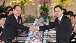 台海政治若即若离,经济互相依存。图为两岸2010年6月举行ECFA谈判时