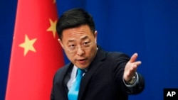 资料照:2020年2月24日,中国外交部发言人赵立坚在北京举行的例行新闻发布会上。(美联社)