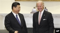 中国国家副主席习近平2月14日访问白宫时与美国副总统拜登会晤