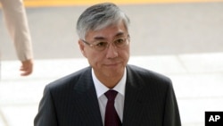 中国驻韩国大使邱国红抵达韩国外交部,韩方召见中国大使,提出抗议(2016年10月11日)