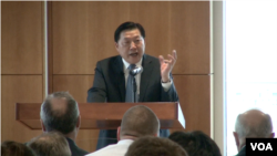 2014年12月2日,中国网信办主任鲁炜在乔治•华盛顿大学发表讲话。(美国之音郁岗拍摄)
