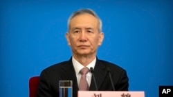 中国国务院副总理刘鹤2018年3月20日在北京见记者(美联社)