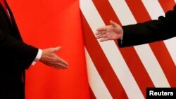 美国总统川普和中国国家主席习近平在北京人大会堂举行会晤。(2017年11月9日)