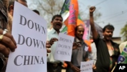 2012年3月21日印度抗议人士在Guahati举行抗议,反对中国在布拉马普特拉河(Brahmaputra River)中游地区建造大坝。