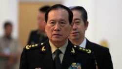 2018年6月18日中国国防部长魏凤和抵达柬埔寨金边的和平宫准备会见柬埔寨首相洪森(美联社)