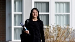 华为首席财务官孟晚舟离开在温哥华的家宅前往法庭(路透社2021年3月22日)