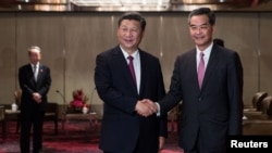 习近平2017年6月会见即将卸任香港特首的梁振英(路透社)