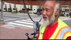 中国农民骑三轮车周游世界抵华盛顿 中国农民骑三轮车周游世界抵华盛顿