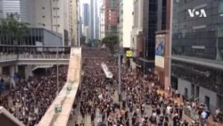 香港爆发空前“黑衣大游行” “暂缓”修例效果有限 香港爆发空前“黑衣大游行” “暂缓”修例效果有限
