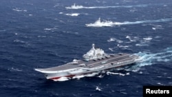 2016年12月,中国辽宁号航母舰队在南中国海从事军事演习