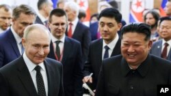 韩国情报机构表示,朝鲜军队1月中旬以来未在库尔斯克参战。图为俄罗斯总统弗拉基米尔·普京与朝鲜领导人金正恩。