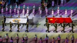 在武汉举行的2019年世界军人运动会上,中国人民解放军列队行进。