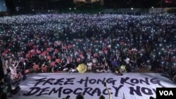 香港人参与民阵6月26日 "G20 香港自由"集会,希望国际社会向北京施压。 (美国之音汤惠芸摄)