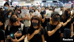香港民众在合唱“愿荣光归香港”的反送中歌曲。(2019年9月21日)