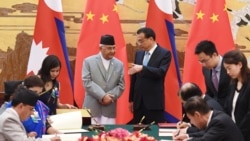 尼泊尔总理奥利在人民大会堂会见中国总理李克强。(2018年6月21日)