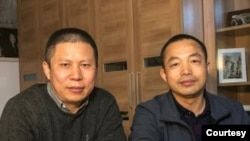资料照片:中国维权律师许志永(左)和丁家喜。