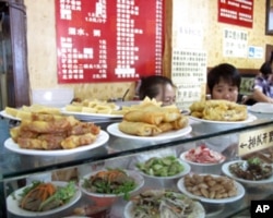 北京的“姚记炒肝店”在拜登副总统访问后顾客爆满,相当走红