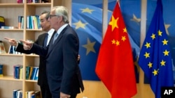 欧盟主席让.克洛德.容克和中国外长王毅 在欧盟布鲁塞尔总部(2018年6月1日)