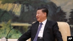 中国国家主席习近平2020年1月28日会晤世界卫生组织总干事谭德塞,声言他“一直亲自指挥、亲自部署”应对冠状病毒疫情。