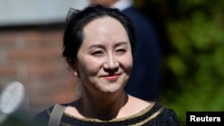 资料照片:华为首席财务官孟晚舟出席法庭听证会。(2020年5月27日)