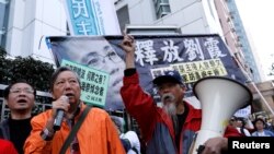 香港人2017年12月25日上街争取中国民主自由(路透社)