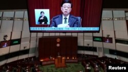 香港特区政府行政长官李家超在立法院发表任内第3份施政报告。(2024年10月16日)