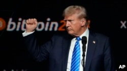 资料照:特朗普在田纳西州纳什维尔举行的比特币2024大会上发表讲话。(2024年7月27日)