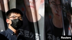 黄之锋等12位香港立法会参选人被取消参选资格(路透社)