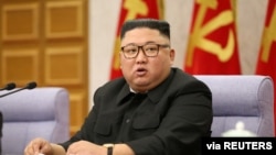朝鲜领导人金正恩。2021年3月21日,朝鲜在时隔近一年后再次试射导弹