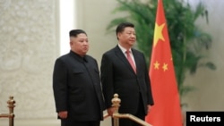 中国国家主席习近平在北京与朝鲜领导人金正恩见面。(2019年1月10日朝鲜朝中社发布)