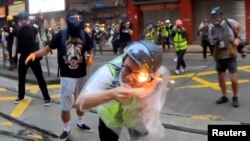 在香港抗议活动中被燃烧装置击中受伤的香港记者(2019年10月6日)