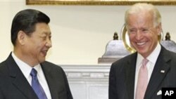 中国国家副主席习近平2月14日访问白宫时与美国副总统拜登会晤