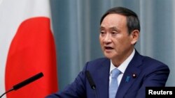 资料照:日本内阁官房长官菅义伟在记者会上讲话。(2019年9月11日)